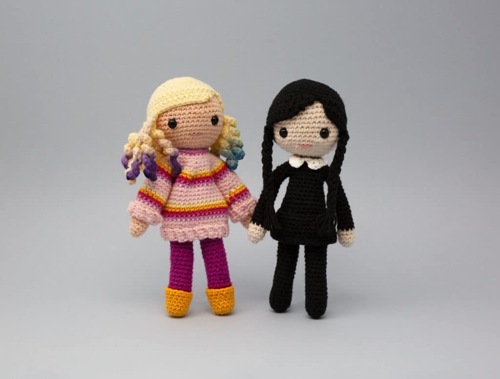 Wednesday and Enid crochet dolls